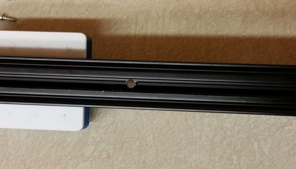This is the hole drilled in the center of the aluminum rail.